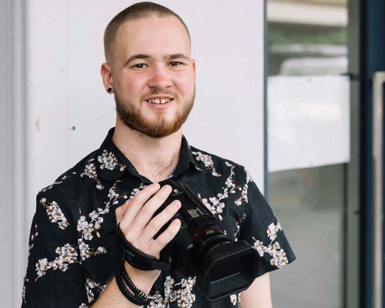A person holding a camera.